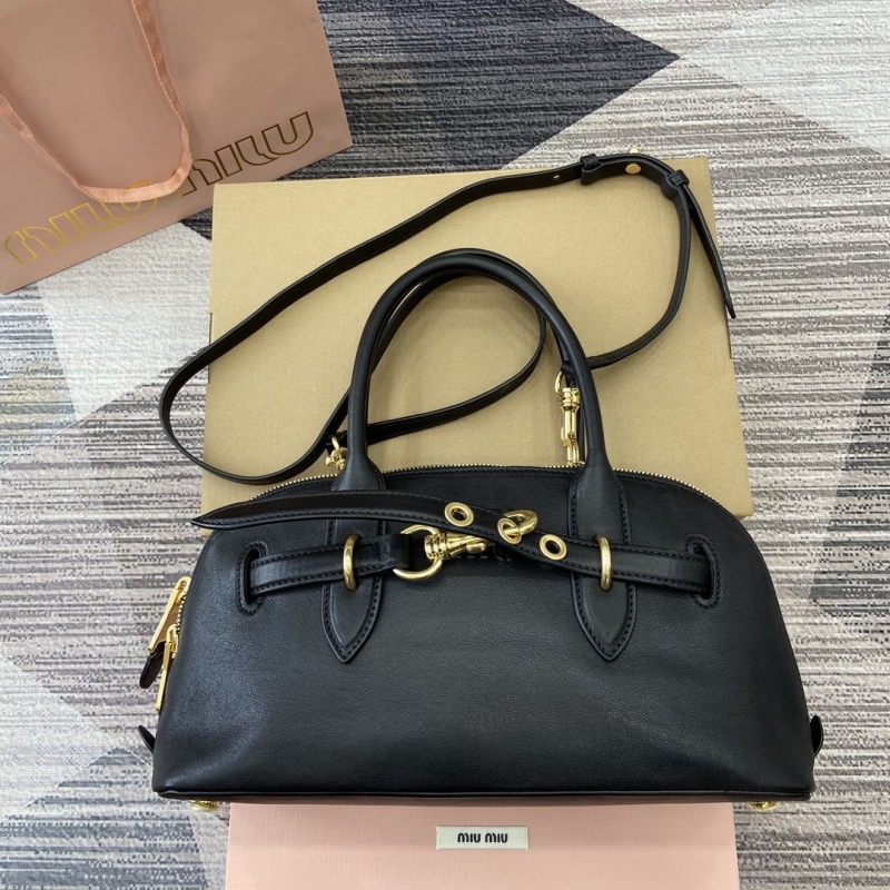 G*u*i top handle bags